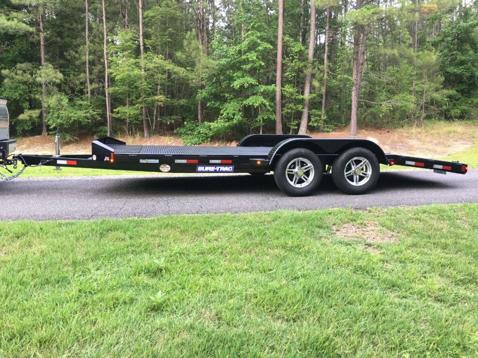 2022 Black Sure-Trac 7ft X 18ft Tandem , located at 1330 Rainey Rd., Macon, 31220, (478) 960-1044, 32.845638, -83.778687 - Please Hurry! Clearance Priced to Sell! New Deluxe Sure Trac Brand 7ft X 18ft All Steel Car Hauler Trailer. 7ft Wide and 18ft Long, Including the 48" Long Beaver Tail Low Profile Design for Easy Loading that Porsche or BMW Car! The Rear Slide Under Ramps are Both Lightweight and Heavy Duty! Rem - Photo #1