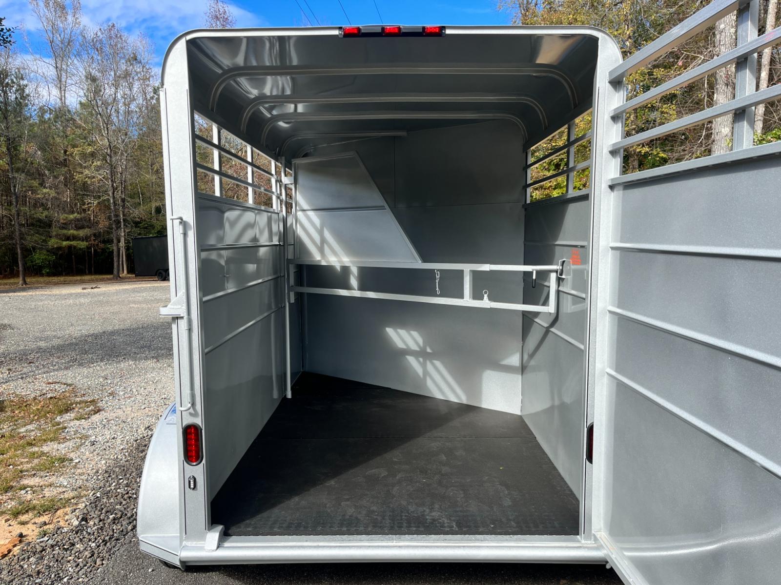 2023 Silver Metallic Calico 2 Horse Slant , located at 1330 Rainey Rd., Macon, 31220, (478) 960-1044, 32.845638, -83.778687 - Brand New 2023 Model 2 Horse Slant Calico Brand Trailer! 6ft Wide X 13ft Long Deluxe Model Tandem Axle Trailer! Easy Close Slant Divider Latch! 16" Radials! Beautiful Silver Metallic Paint is Awesome! Black Pin Striping Looks Fantastic! Fully Caulked Inside and Out to Prevent Rust! The Paint i - Photo #17