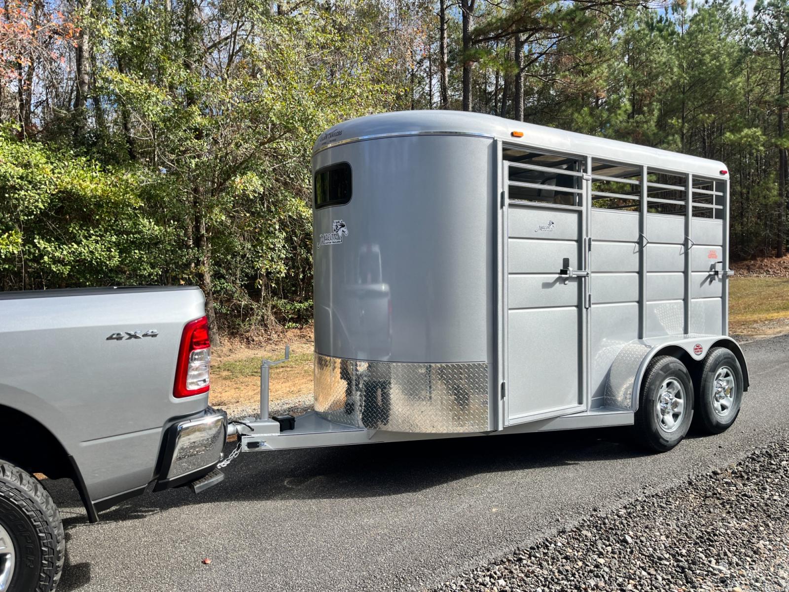 2023 Silver Metallic Calico 2 Horse Slant , located at 1330 Rainey Rd., Macon, 31220, (478) 960-1044, 32.845638, -83.778687 - Brand New 2023 Model 2 Horse Slant Calico Brand Trailer! 6ft Wide X 13ft Long Deluxe Model Tandem Axle Trailer! Easy Close Slant Divider Latch! 16" Radials! Beautiful Silver Metallic Paint is Awesome! Black Pin Striping Looks Fantastic! Fully Caulked Inside and Out to Prevent Rust! The Paint i - Photo #1