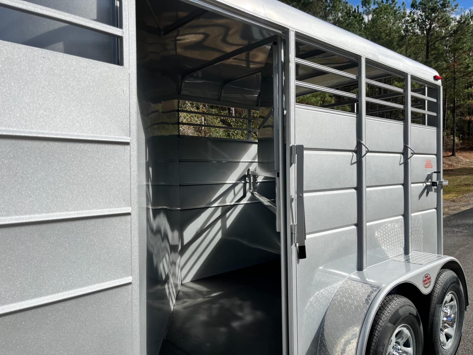 2023 Silver Metallic Calico 2 Horse Slant , located at 1330 Rainey Rd., Macon, 31220, (478) 960-1044, 32.845638, -83.778687 - Brand New 2023 Model 2 Horse Slant Calico Brand Trailer! 6ft Wide X 13ft Long Deluxe Model Tandem Axle Trailer! Easy Close Slant Divider Latch! 16" Radials! Beautiful Silver Metallic Paint is Awesome! Black Pin Striping Looks Fantastic! Fully Caulked Inside and Out to Prevent Rust! The Paint i - Photo #23