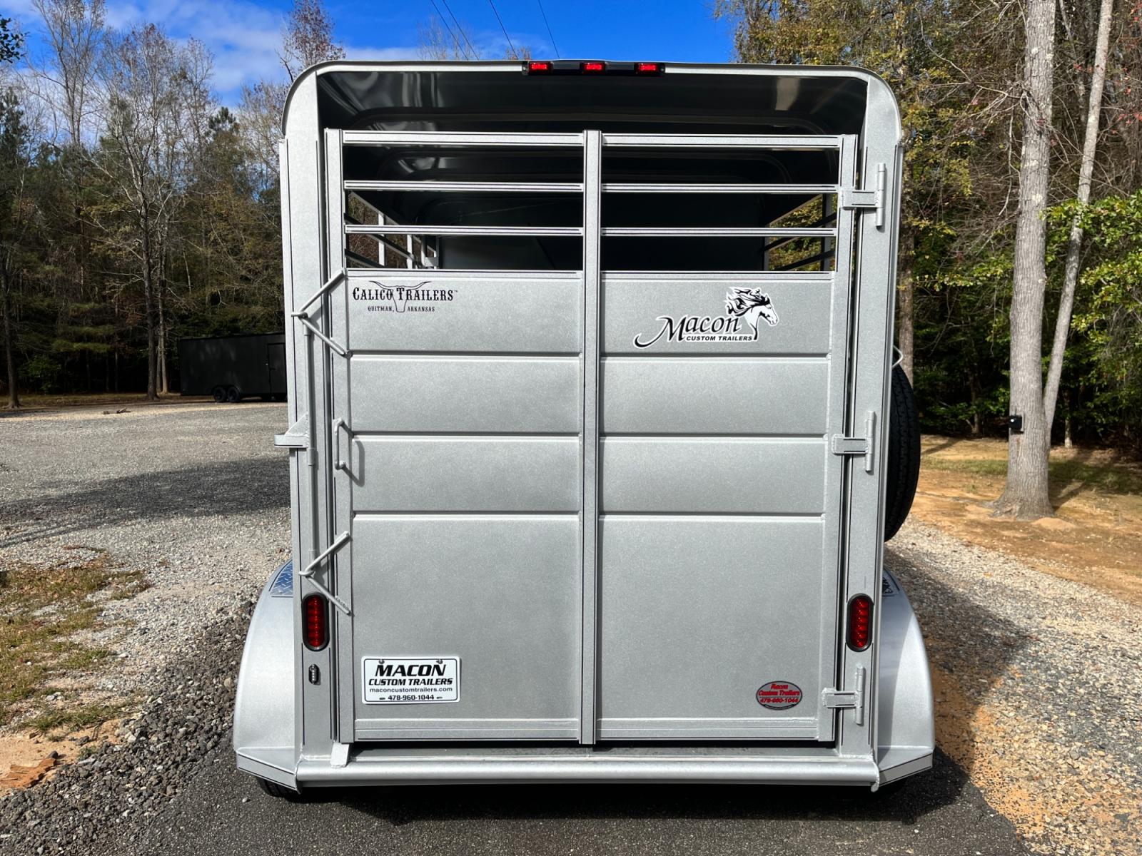 2023 Silver Metallic Calico 2 Horse Slant , located at 1330 Rainey Rd., Macon, 31220, (478) 960-1044, 32.845638, -83.778687 - Brand New 2023 Model 2 Horse Slant Calico Brand Trailer! 6ft Wide X 13ft Long Deluxe Model Tandem Axle Trailer! Easy Close Slant Divider Latch! 16" Radials! Beautiful Silver Metallic Paint is Awesome! Black Pin Striping Looks Fantastic! Fully Caulked Inside and Out to Prevent Rust! The Paint i - Photo #3