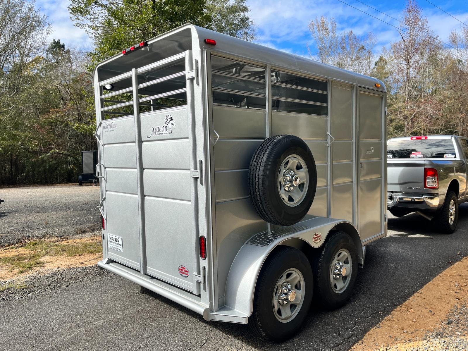 2023 Silver Metallic Calico 2 Horse Slant , located at 1330 Rainey Rd., Macon, 31220, (478) 960-1044, 32.845638, -83.778687 - Brand New 2023 Model 2 Horse Slant Calico Brand Trailer! 6ft Wide X 13ft Long Deluxe Model Tandem Axle Trailer! Easy Close Slant Divider Latch! 16" Radials! Beautiful Silver Metallic Paint is Awesome! Black Pin Striping Looks Fantastic! Fully Caulked Inside and Out to Prevent Rust! The Paint i - Photo #4