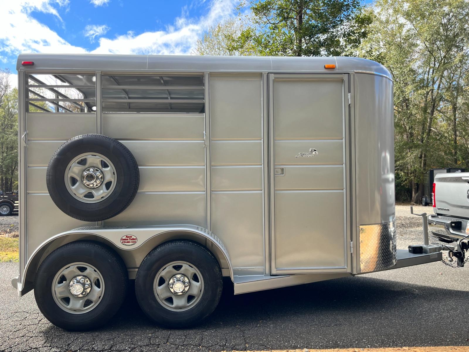 2023 Silver Metallic Calico 2 Horse Slant , located at 1330 Rainey Rd., Macon, 31220, (478) 960-1044, 32.845638, -83.778687 - Brand New 2023 Model 2 Horse Slant Calico Brand Trailer! 6ft Wide X 13ft Long Deluxe Model Tandem Axle Trailer! Easy Close Slant Divider Latch! 16" Radials! Beautiful Silver Metallic Paint is Awesome! Black Pin Striping Looks Fantastic! Fully Caulked Inside and Out to Prevent Rust! The Paint i - Photo #5