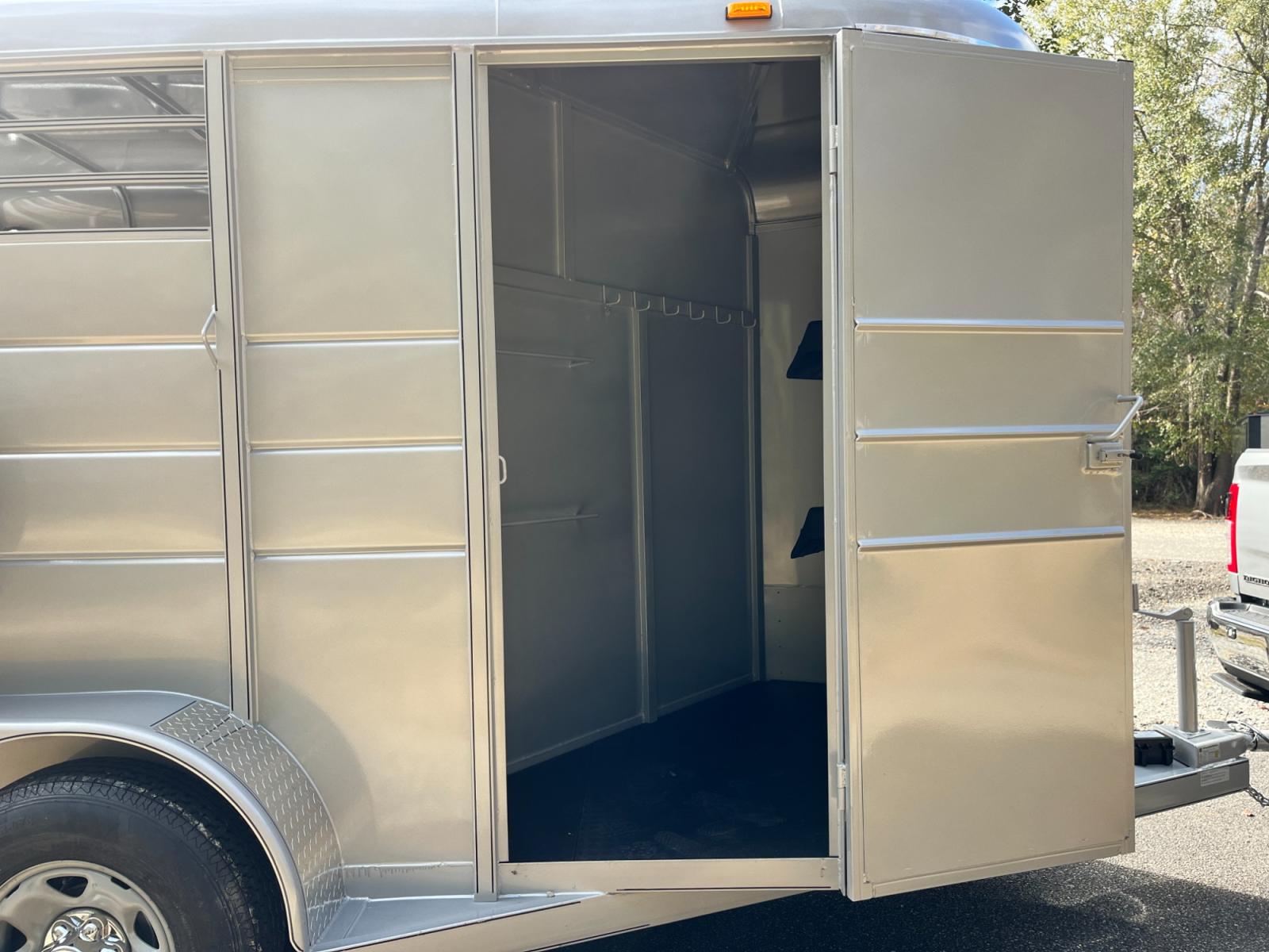 2023 Silver Metallic Calico 2 Horse Slant , located at 1330 Rainey Rd., Macon, 31220, (478) 960-1044, 32.845638, -83.778687 - Brand New 2023 Model 2 Horse Slant Calico Brand Trailer! 6ft Wide X 13ft Long Deluxe Model Tandem Axle Trailer! Easy Close Slant Divider Latch! 16