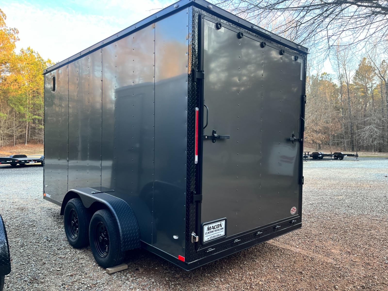 2023 .080 Charcoal Metallic w/Black Out Pkg. Elite Cargo 7ft X 14ft Tandem , located at 1330 Rainey Rd., Macon, 31220, (478) 960-1044, 32.845638, -83.778687 - Brand New 2023 "Top of the Line" Elite Cargo Brand Trailer Made in South Ga. Awesome 7ft X 14ft Tandem Enclosed Cycle Hauler & Cargo Trailer! Taller Inside Height is 7ft 6" Tall Inside & Ramp Door Clearance is 7ft! .080 Thick Metallic Charcoal Aluminum Skin is Awesome! Black Out Pkg Trim, Wider - Photo #4