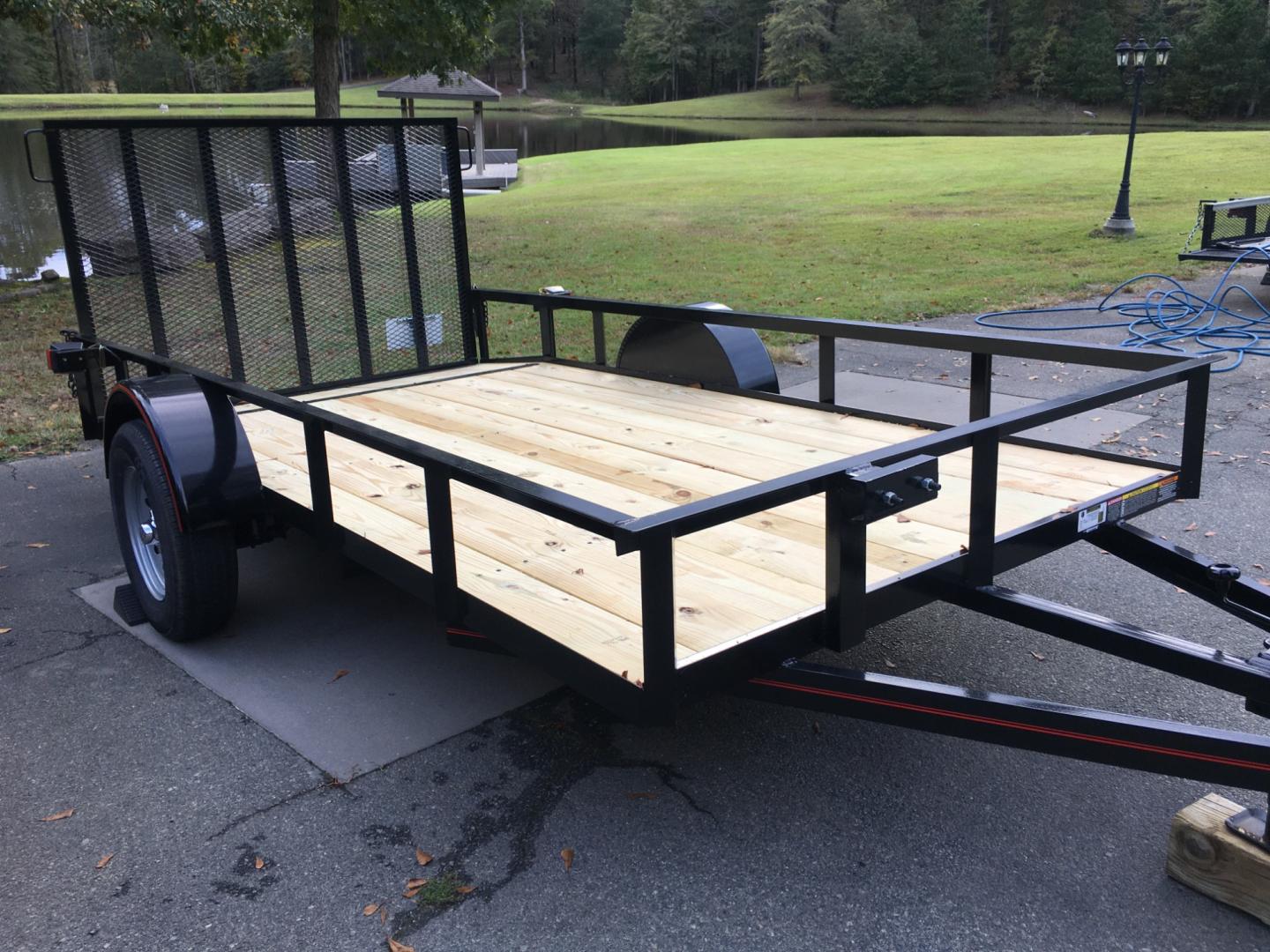 2023 Black Macon Custom Utility & Landscape , located at 1330 Rainey Rd., Macon, 31220, (478) 960-1044, 32.845638, -83.778687 - 6ft Wide X 12ft Long Utility Trailer is Really Loaded Out! 24" Beavertail Floor at the Rear, Makes it Easy to Load! Haul Lawn Tractor, Lawn Mowers, Landscaping Equipment, Water Tanks, ATV's, Etc. 3,500 lb Axle, 7 Pin Connector Heavy Duty with 2" X 3" Angle Iron Floor Joists! Most Companies Use - Photo#1