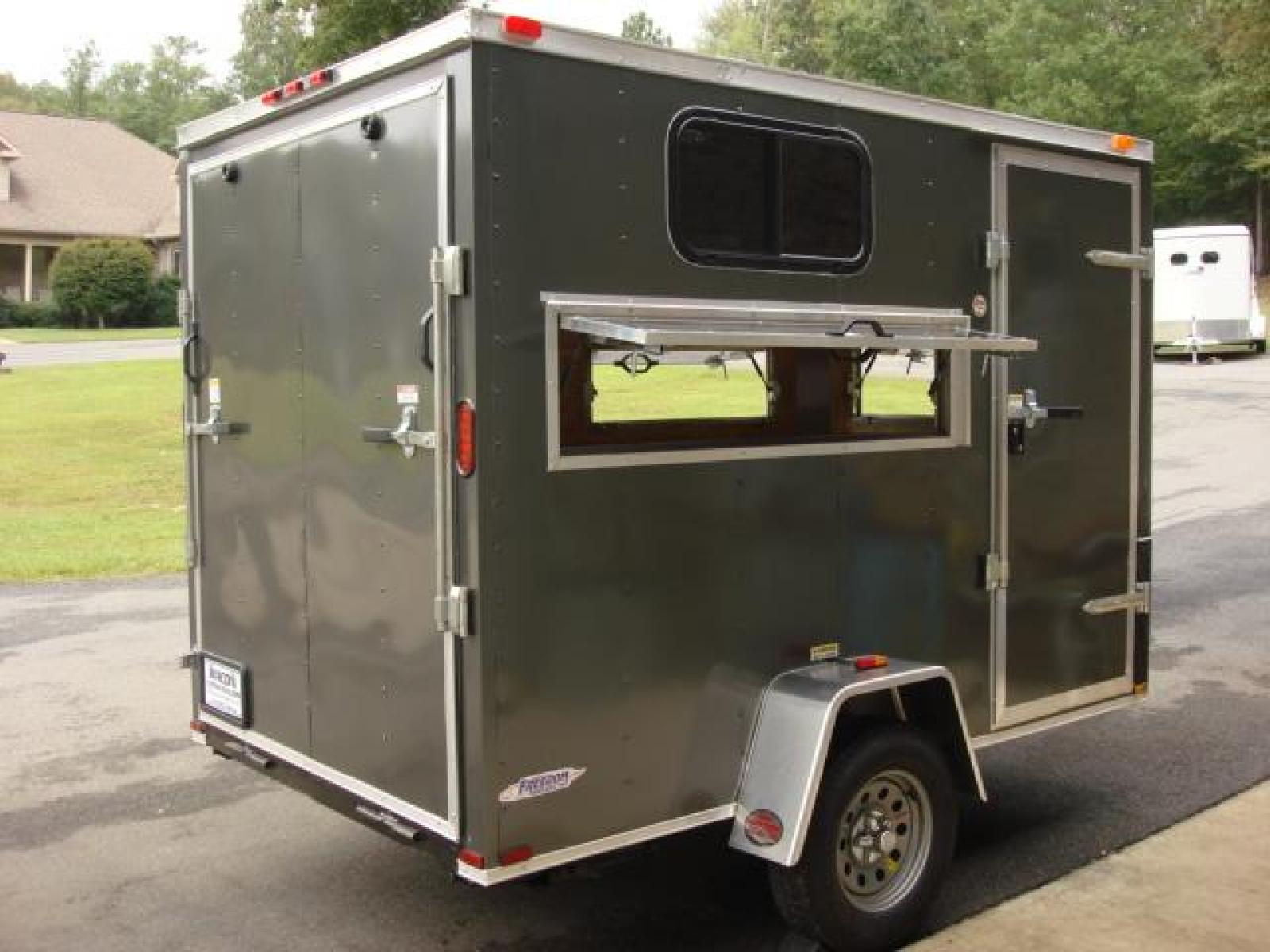 2023 Charcoal Metallic Freedom 6ft X 10ft Hunting Trailer , located at 1330 Rainey Rd., Macon, 31220, (478) 960-1044, 32.845638, -83.778687 - We Sold This Trailer to a Customer in Tennessee, for His Handicapped Son to Hunt Inside! We Could Special Order You One in About 6 Weeks! Call for Current Price! This Price can Vary! Brand New Enclosed Hunting Trailer! Haul Your ATV and Then Hunt From The Same Trailer! Stay Warm & Dry Whil - Photo #8