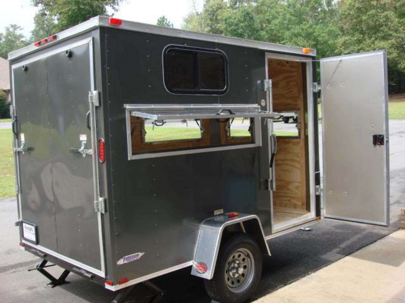 2023 Charcoal Metallic Freedom 6ft X 10ft Hunting Trailer , located at 1330 Rainey Rd., Macon, 31220, (478) 960-1044, 32.845638, -83.778687 - We Sold This Trailer to a Customer in Tennessee, for His Handicapped Son to Hunt Inside! We Could Special Order You One in About 6 Weeks! Call for Current Price! This Price can Vary! Brand New Enclosed Hunting Trailer! Haul Your ATV and Then Hunt From The Same Trailer! Stay Warm & Dry Whil - Photo #15
