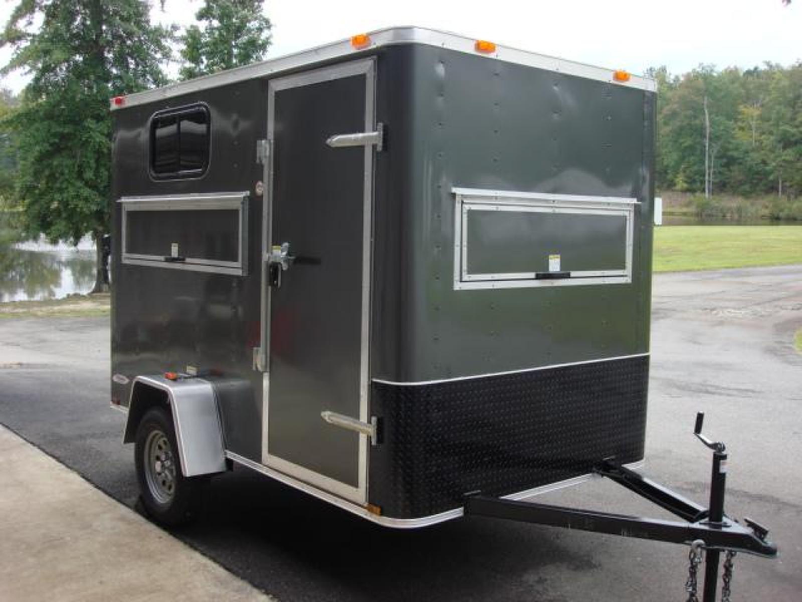 2023 Charcoal Metallic Freedom 6ft X 10ft Hunting Trailer , located at 1330 Rainey Rd., Macon, 31220, (478) 960-1044, 32.845638, -83.778687 - We Sold This Trailer to a Customer in Tennessee, for His Handicapped Son to Hunt Inside! We Could Special Order You One in About 6 Weeks! Call for Current Price! This Price can Vary! Brand New Enclosed Hunting Trailer! Haul Your ATV and Then Hunt From The Same Trailer! Stay Warm & Dry Whil - Photo #20