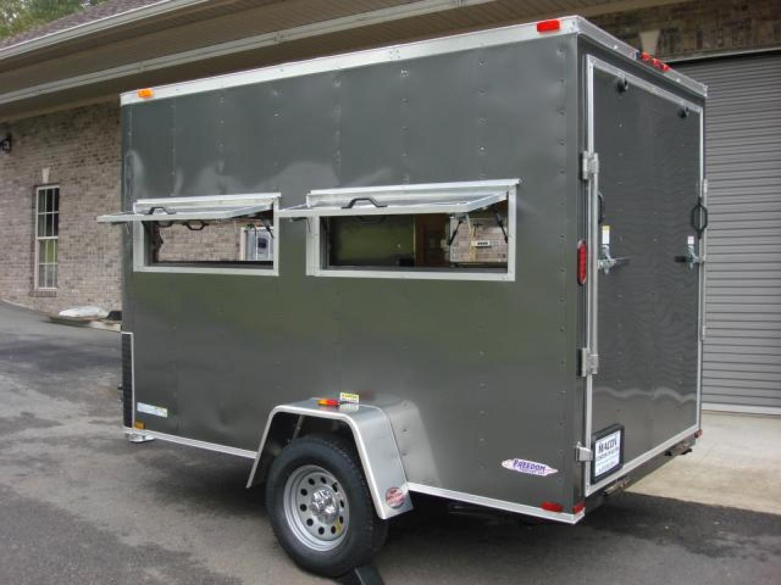 2023 Charcoal Metallic Freedom 6ft X 10ft Hunting Trailer , located at 1330 Rainey Rd., Macon, 31220, (478) 960-1044, 32.845638, -83.778687 - We Sold This Trailer to a Customer in Tennessee, for His Handicapped Son to Hunt Inside! We Could Special Order You One in About 6 Weeks! Call for Current Price! This Price can Vary! Brand New Enclosed Hunting Trailer! Haul Your ATV and Then Hunt From The Same Trailer! Stay Warm & Dry Whil - Photo #4